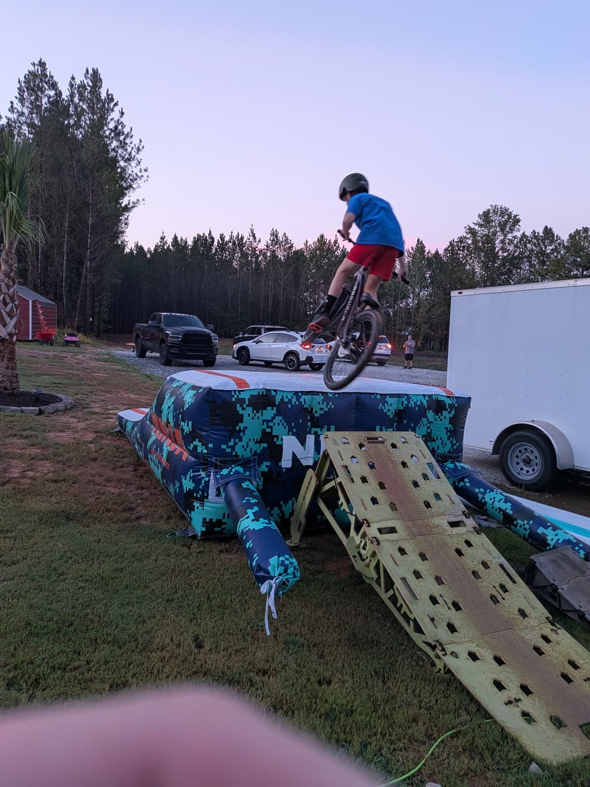 Evening jump session with ramp, air bag, and coaching