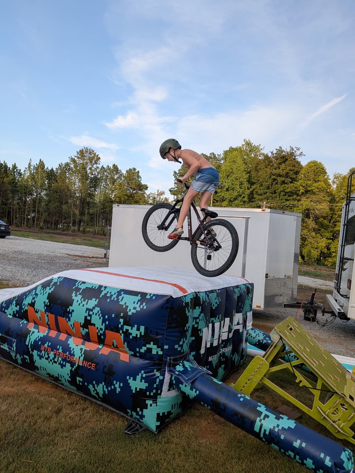 Young rider jumping onto the Ninja air bag